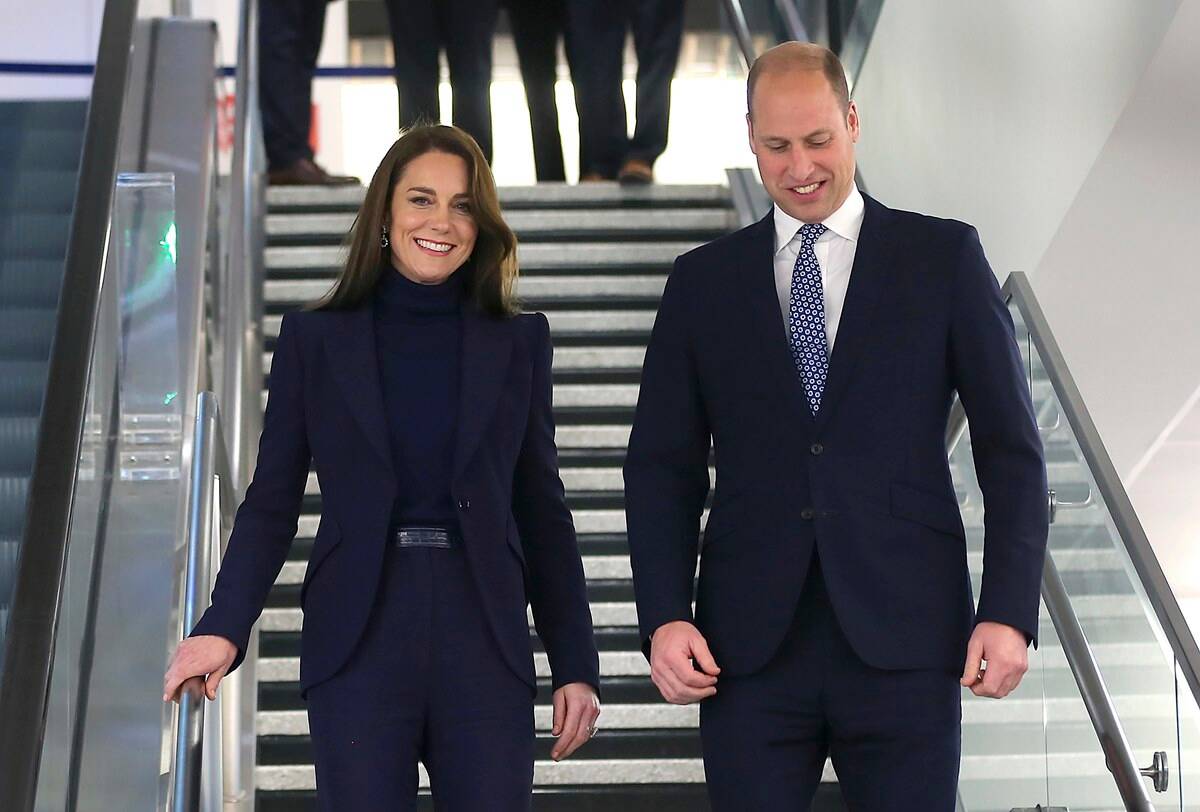 Kate Middleton in a blue-purple suit from Alexander McQueen
